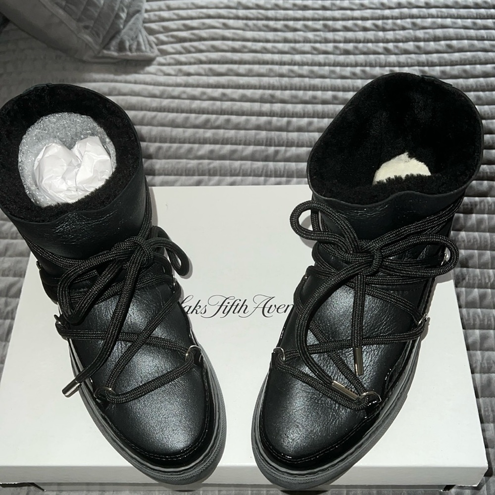 Authentic Inuikii lamb skin sneaker boots.